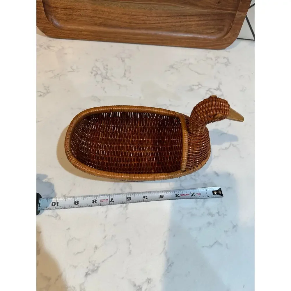 handwoven rattan duck basket elongated oval bowl design integrated duck head